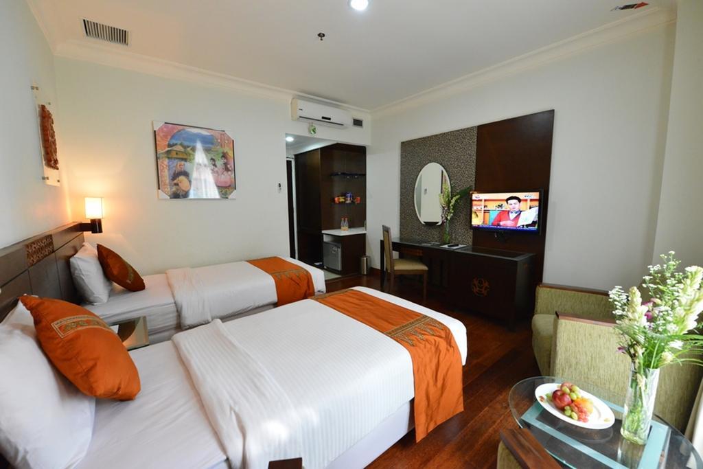 Amazing Kutaradja Hotell Jakarta Rom bilde